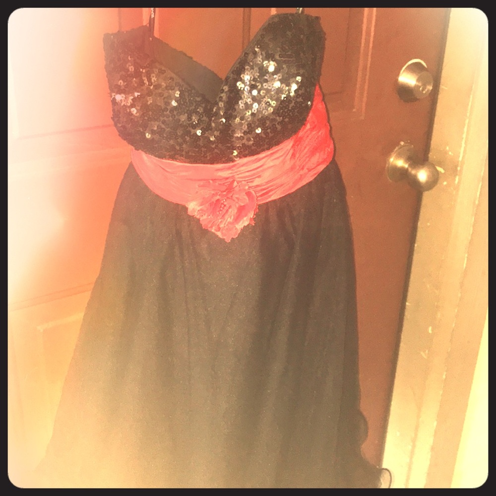It is an all Black with a red flower